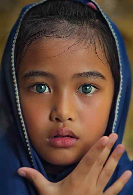 I have seen 50+photos of this young girl but couldn't find her smile idk why...? She is deep and silent...