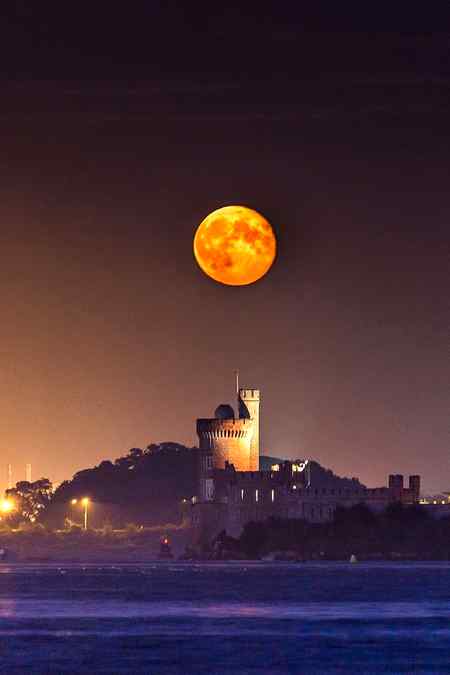 Supermoon rising over blackrock castle,cork ,ireland