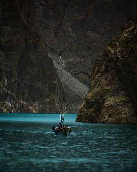 A boat carrying tourist at attabad lake in hunza valley