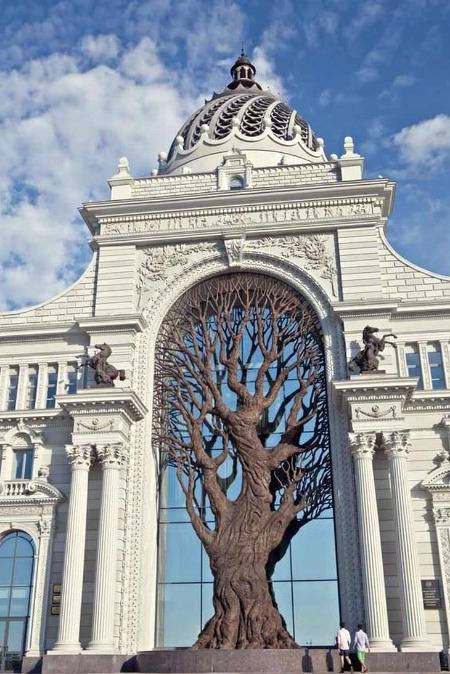 65ft bronze tree grows in Russia's "palace or farmers"archway. This structure is now compliments the Kazan kremlin.