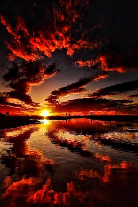 Breathtaking red, fiery sunset nature...