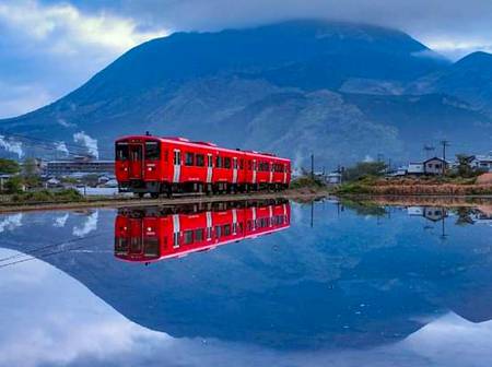 Parfect moment of a train near the onsen  town of yufuin