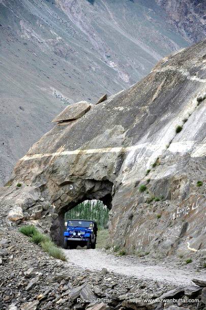 On Askole trek..A jeep passes through a mountain