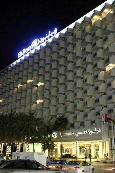 Hotel Exterior at night this Dubai hotel is located on Jumeirah beach, alongside Jumeirah beach residence and the new and trendy mrominade.the walk with its hundreds of restaurents,bars and shopping stores.it feachers around 400 rooms 8restuarents and bars  and pool of fitness room has a private beach..