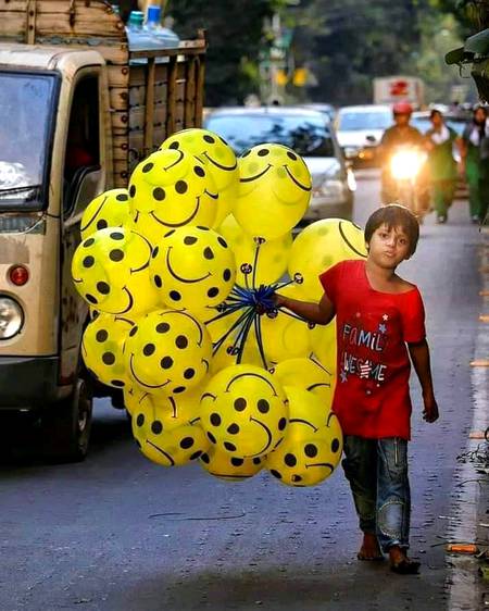 a smile seller without smile on his own face 😐