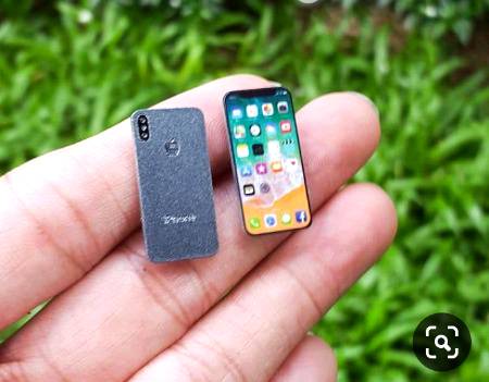 tiny mobile for girls which can hold in