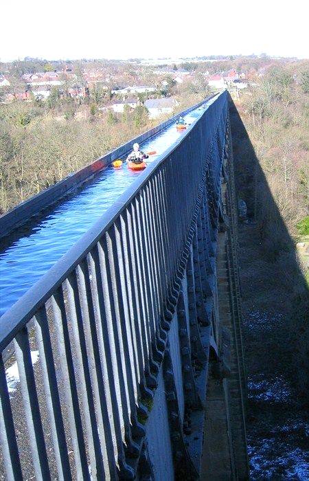 Situated in north-eastern UK wales the 18km long pontcysyllte aqueduct and canal is a feat of civil engineering of the industrial revolution completed in the early years of the 19th century.
