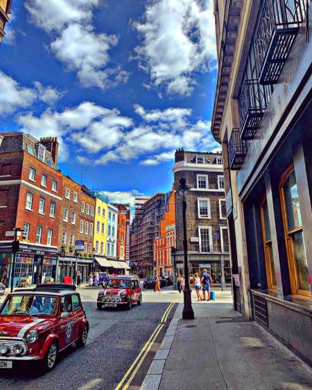 Wild blue sky and colourful buildings