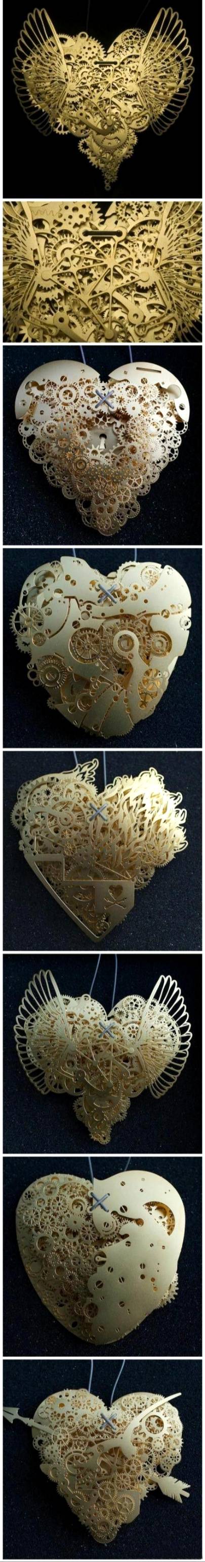 Insanely detailed mechanical paper sculptures.