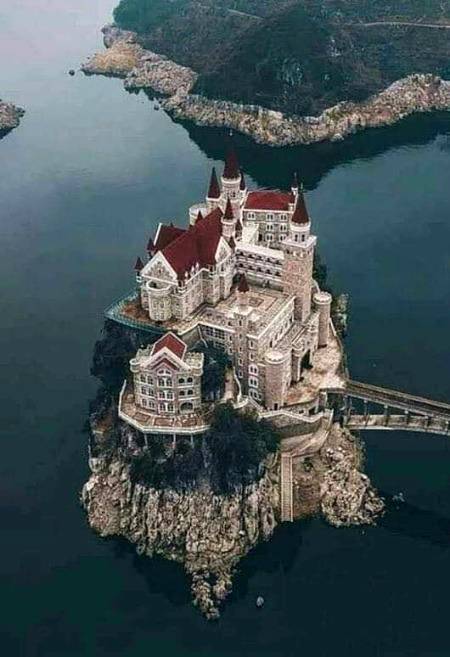 Jilong castle country club a four_star hotel,sits in the center of a remote lake in Southwest China's Guizhou province