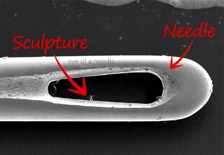 World smallest human Sculpture compared to the eye of a needle