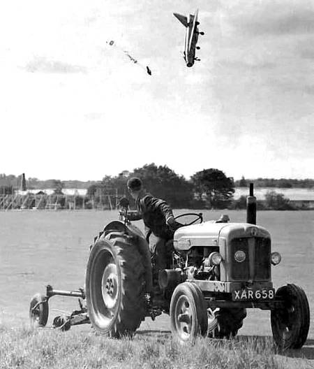 An English Electric Lighting jet crashing in an English field September 1962 the pilot survived