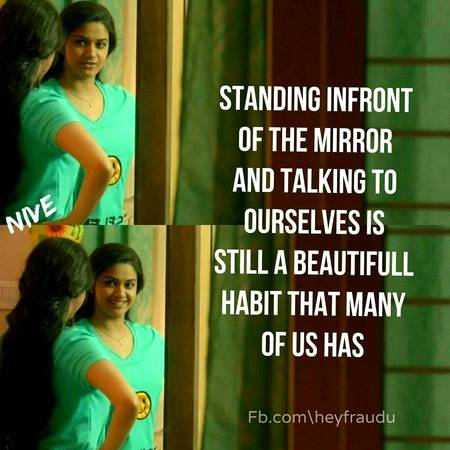 Standing in front of mirror