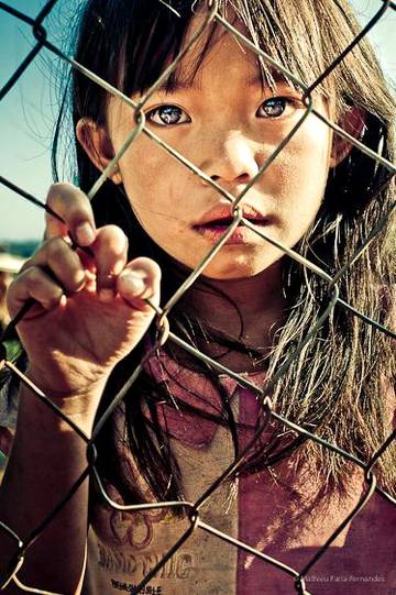 The little girl with bewitching eyes...starting at the photographer.