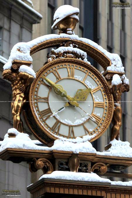 Snow covering the kuafmann's clock
