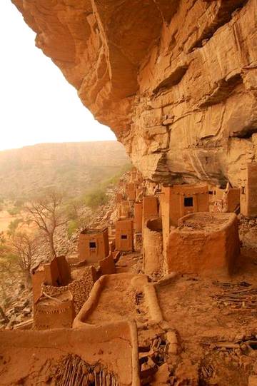 Dogon Homes on the side of rocky mountains__Ancient Tellem village___Dogon country Mali West Africa