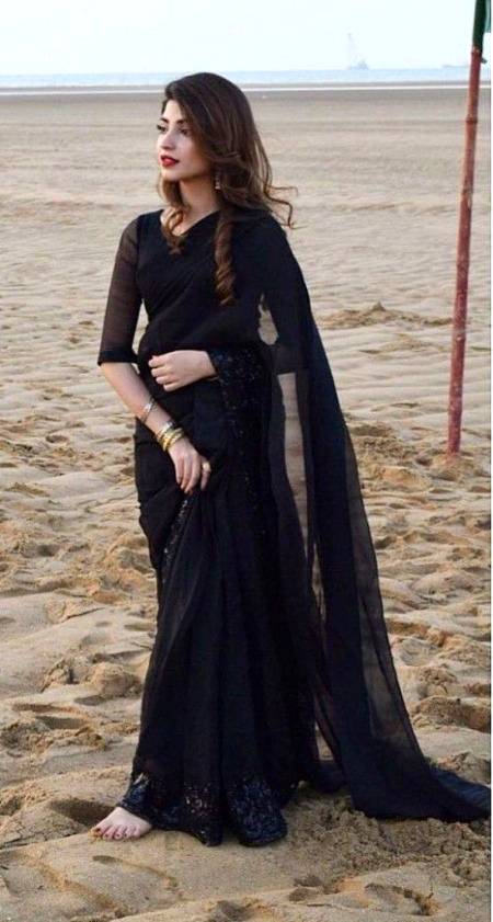Kinza Khan in black