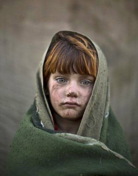 6 years old Laiba hazarat an Afghan refuge child was playing in a slum outskirts of Islamabad photo captured by a press photographer.