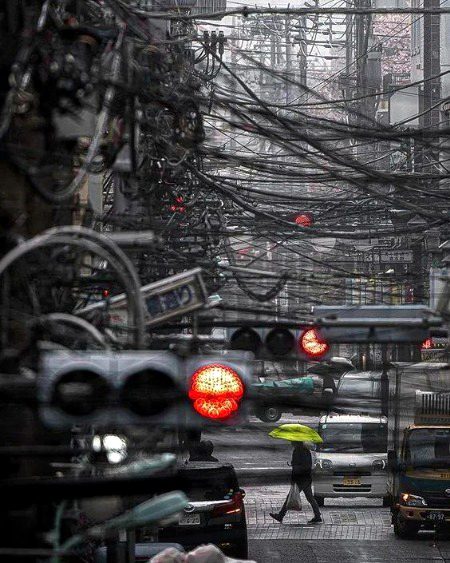 Tokyo cannot use underground power lines because of earthquakes so the result is